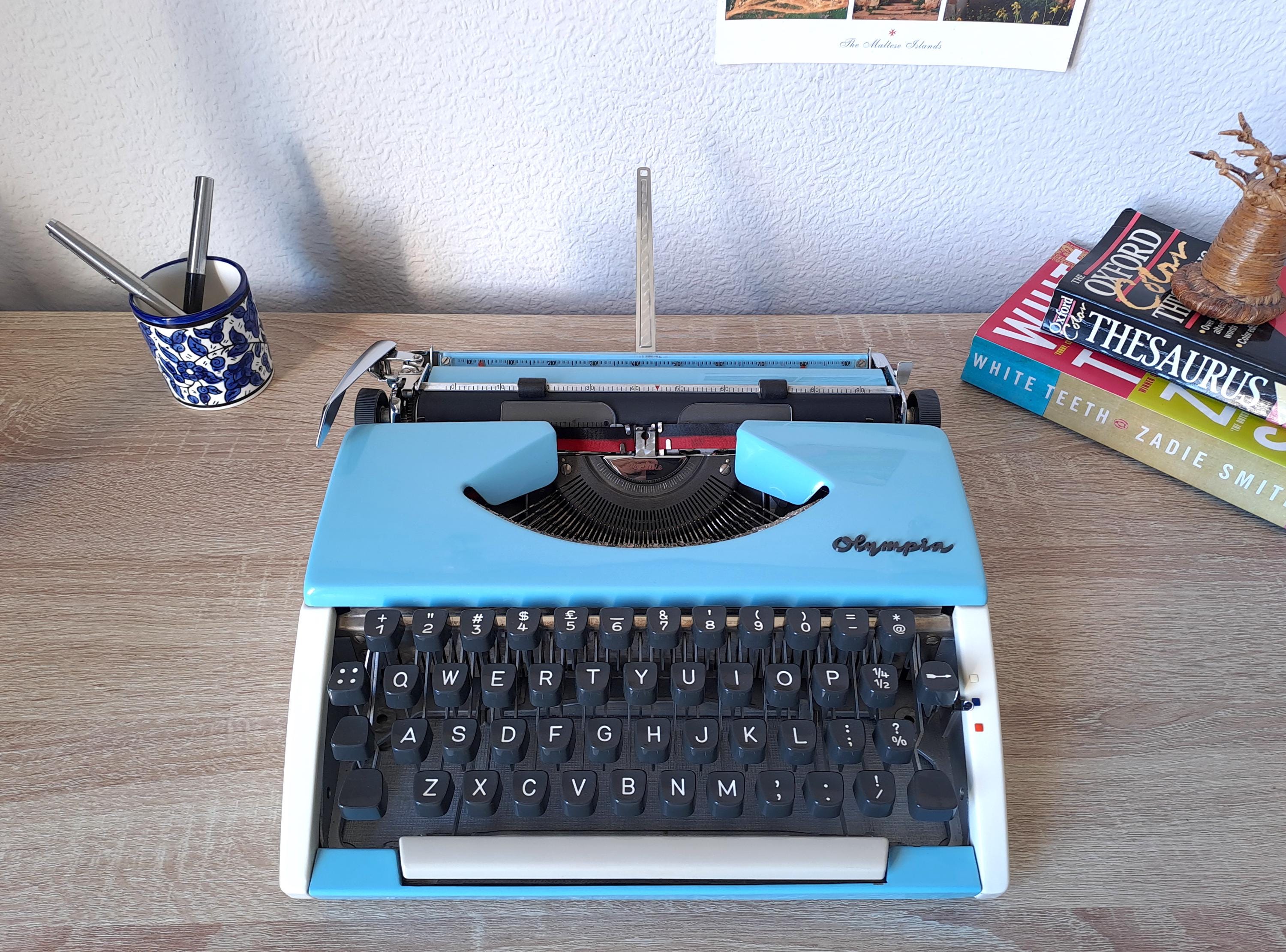 Custom-painted Script (cursive) Olympia SF Typewriter
