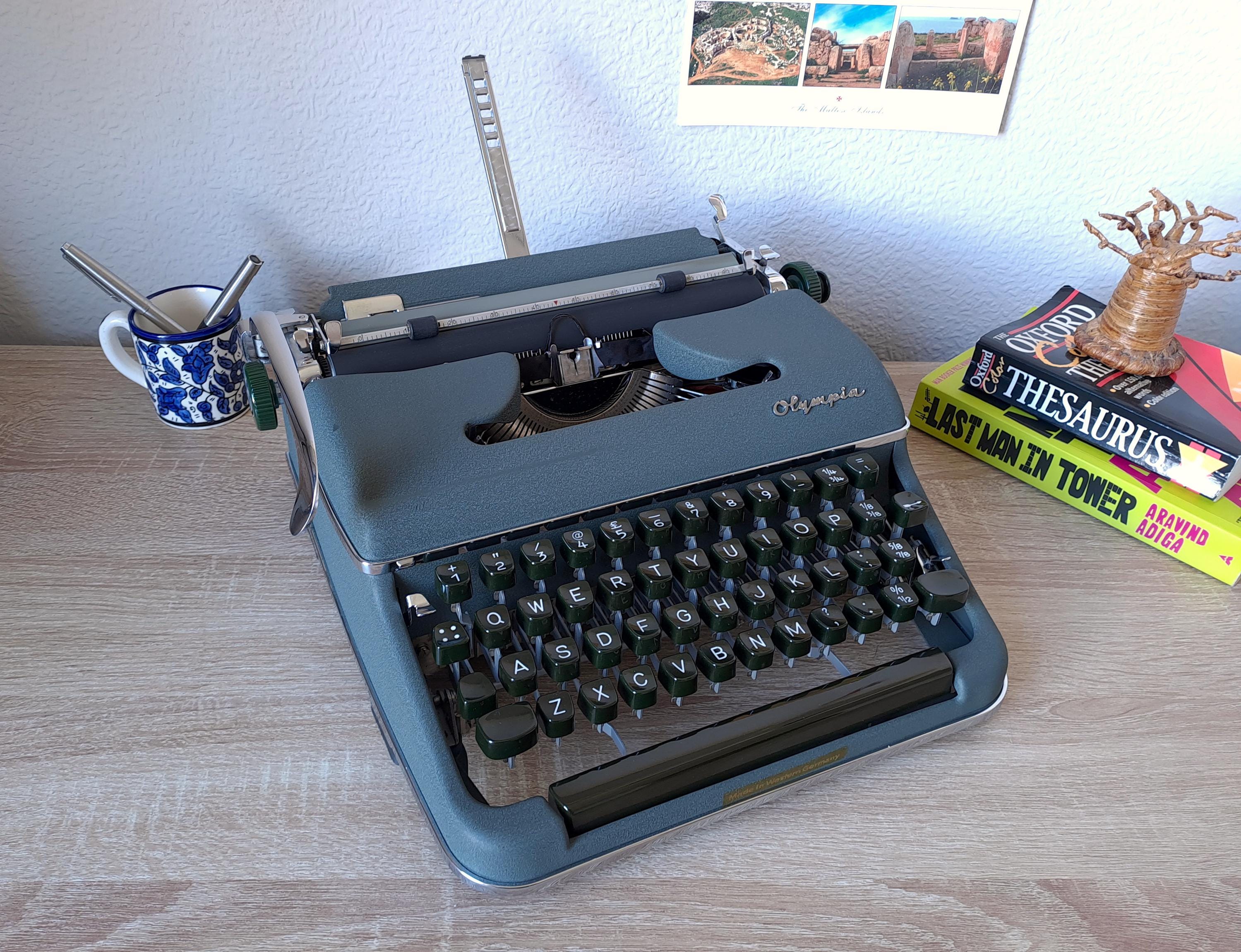 Script (cursive) Olympia SM2 Typewriter