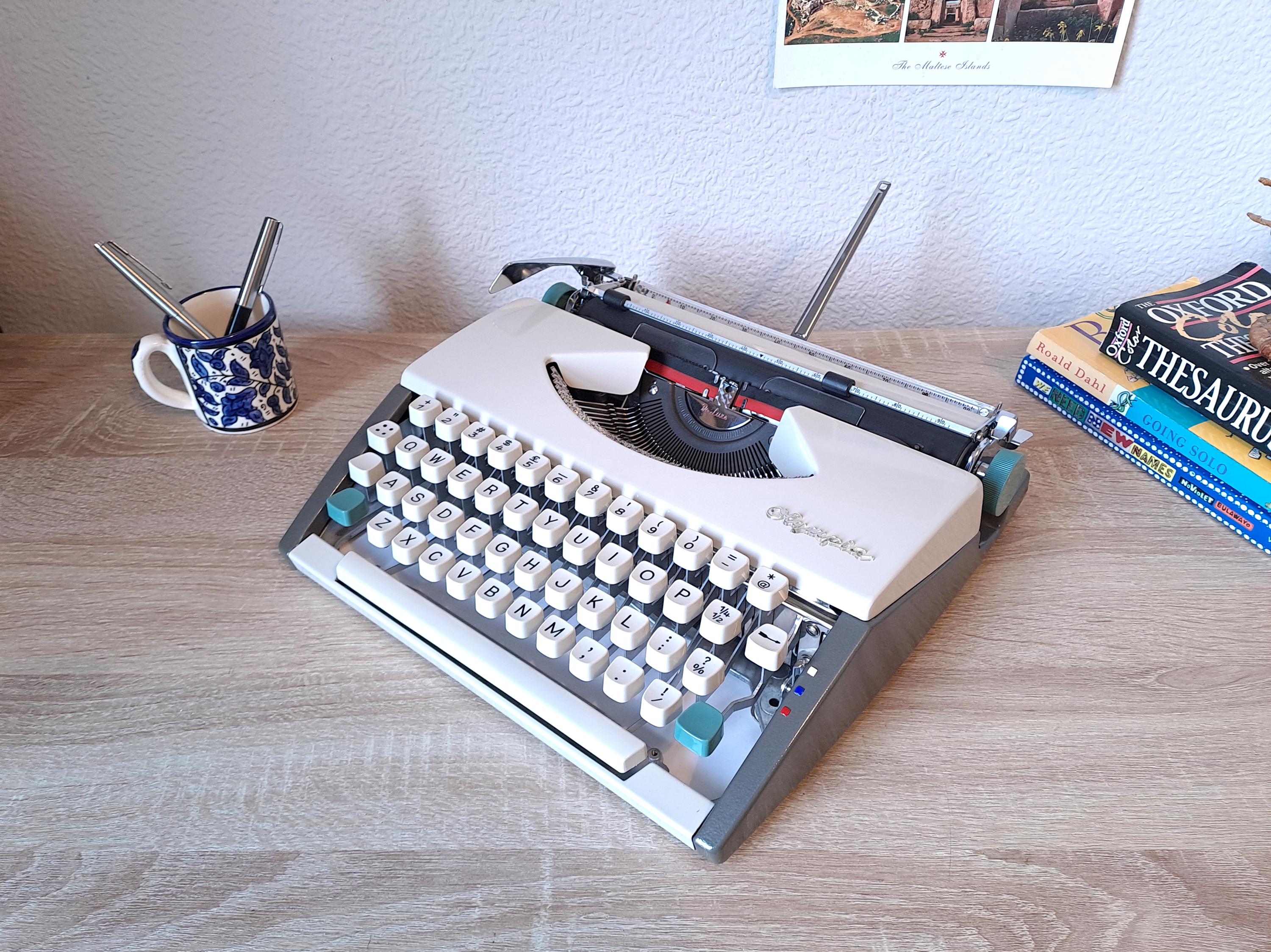Script (Cursive) Olympia SF Typewriter