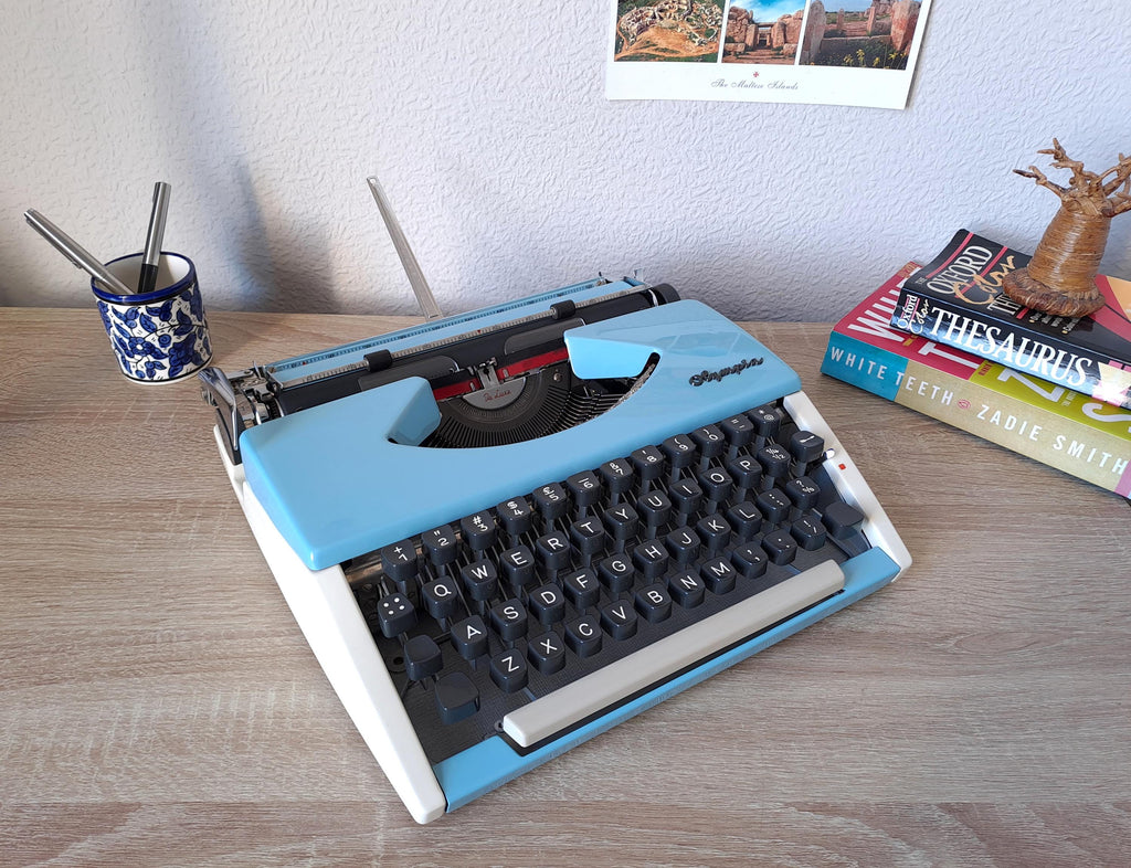 Custom-painted Script (cursive) Olympia SF Typewriter