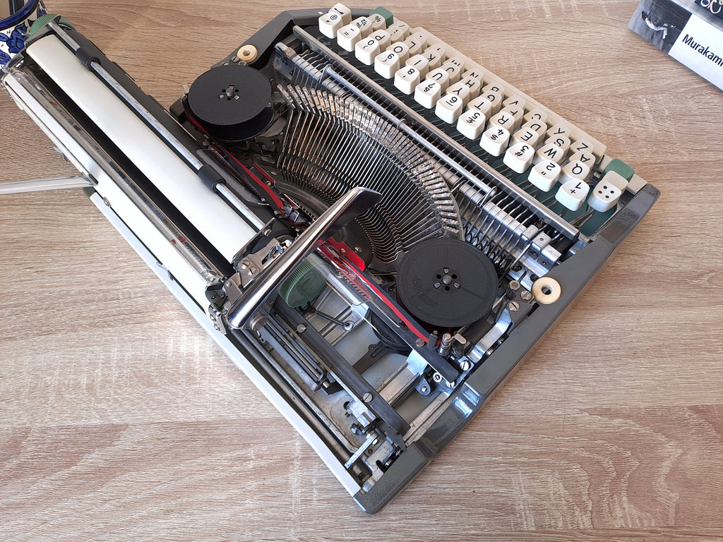 Italic Olympia SF Typewriter