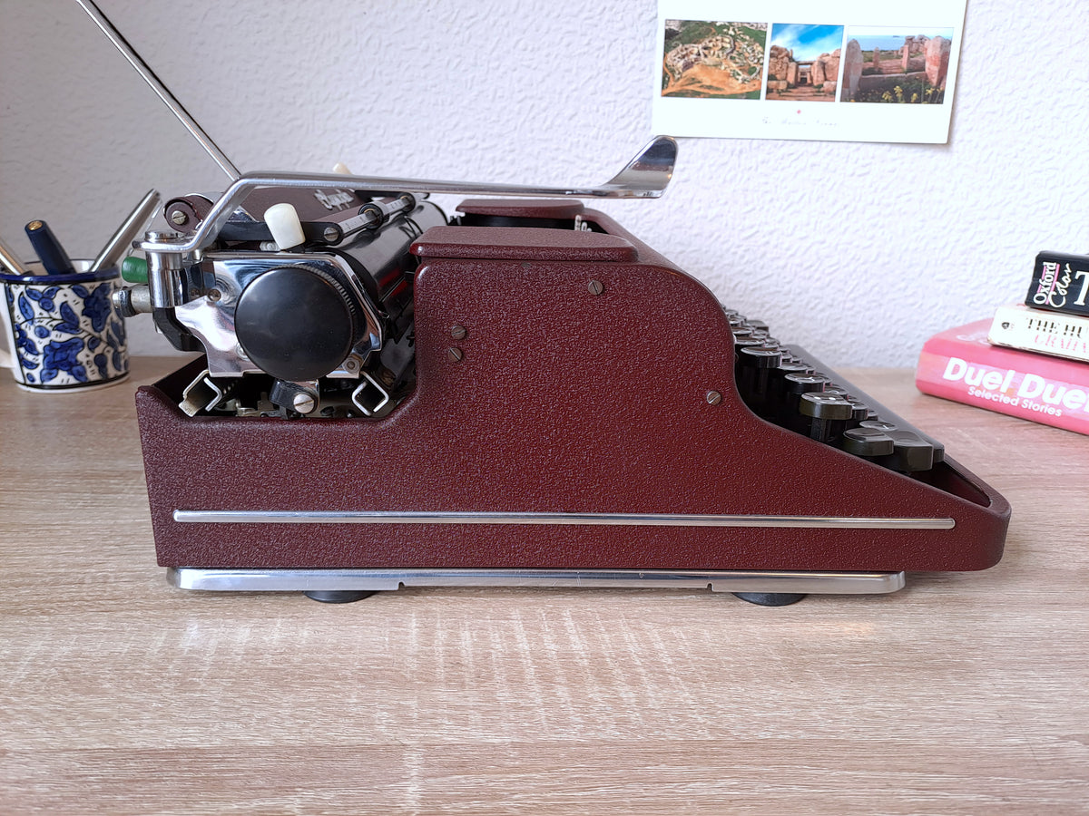 Maroon Olympia SM1 Typewriter