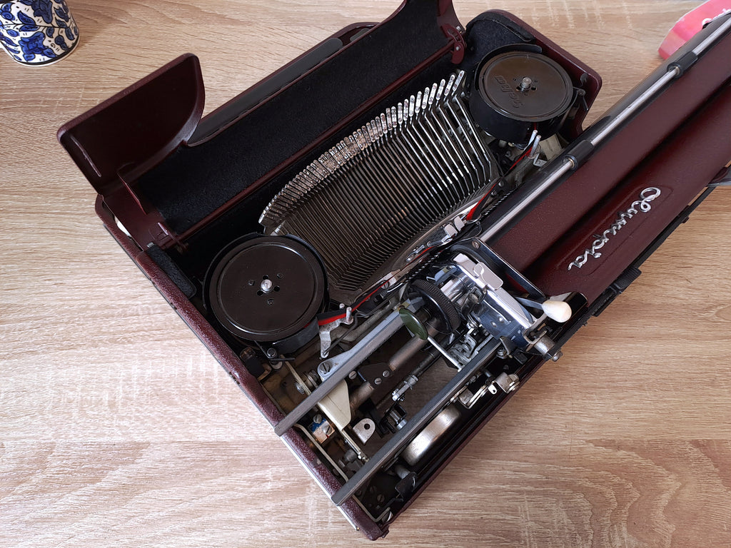 Maroon Olympia SM1 Typewriter