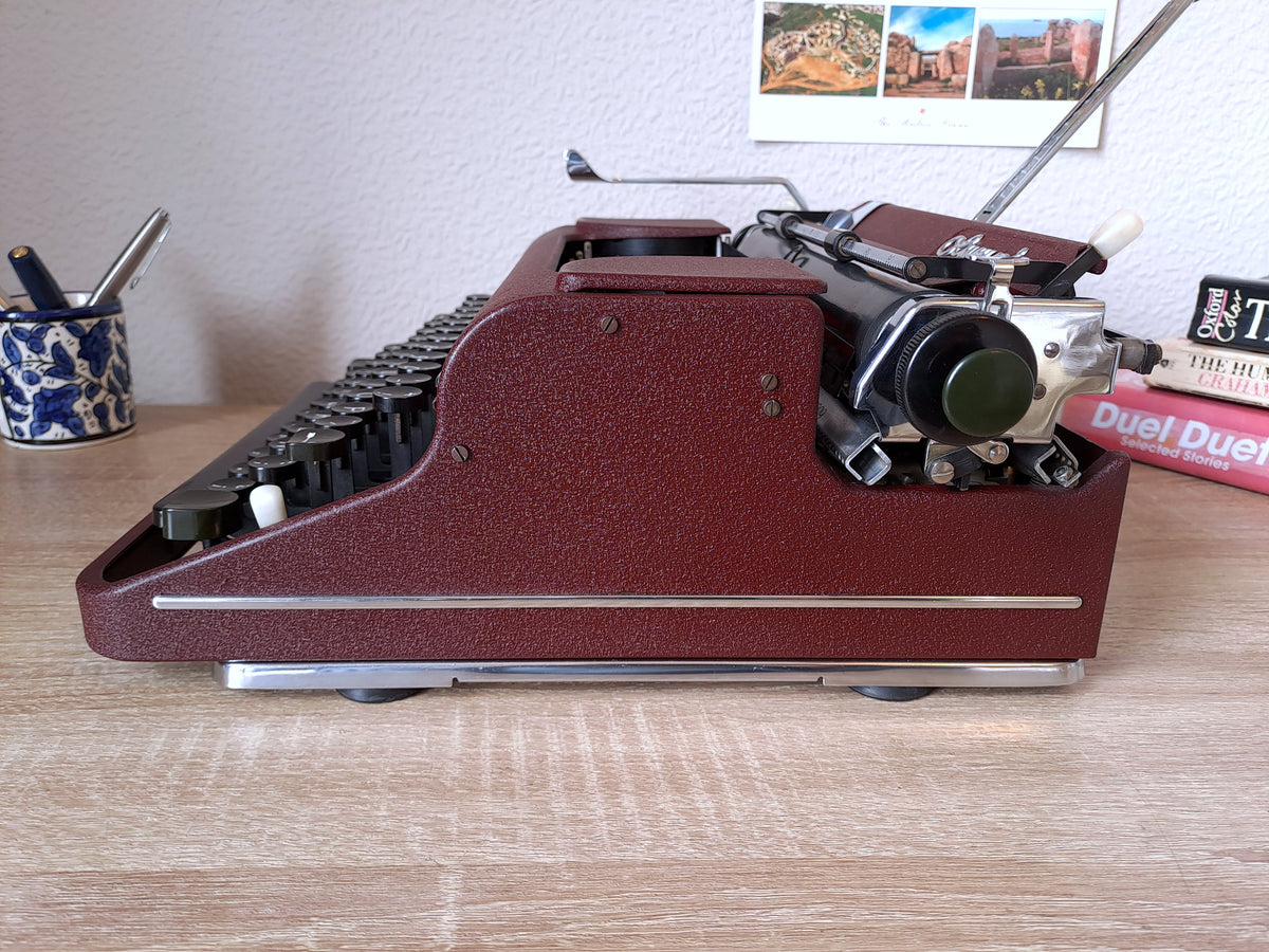 Maroon Olympia SM1 Typewriter