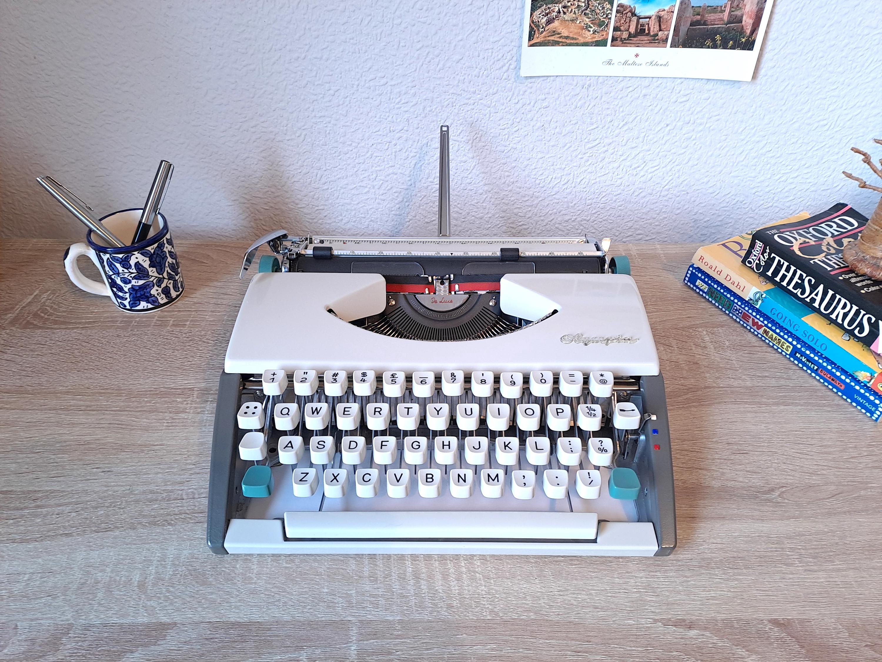 Script (Cursive) Olympia SF Typewriter