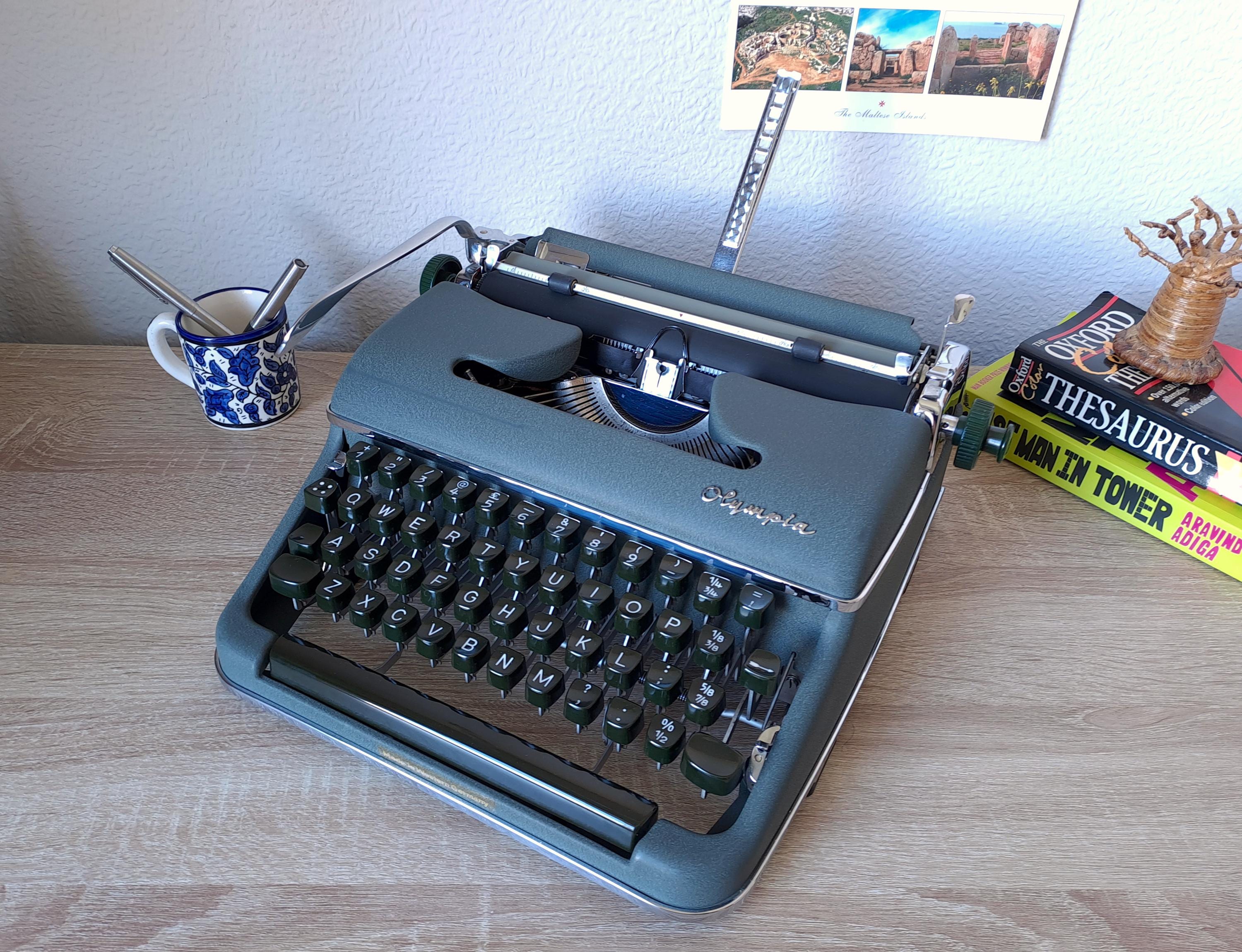 Script (cursive) Olympia SM2 Typewriter