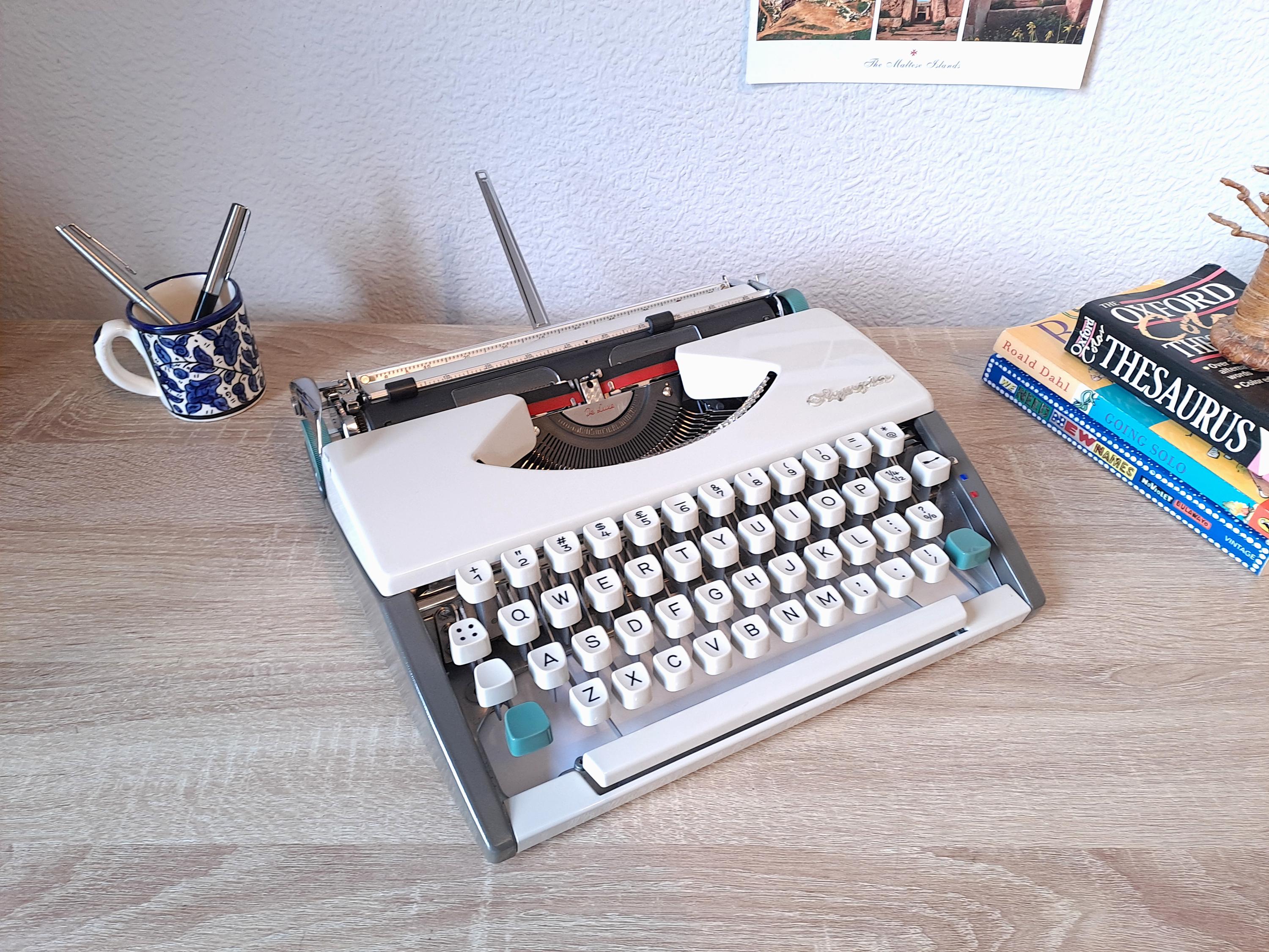 Script (Cursive) Olympia SF Typewriter